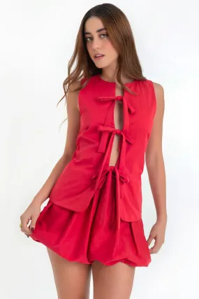 Blusa sin mangas con lazos frontales