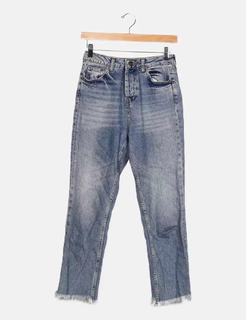 Subdued blue distressed boyfriend jeans.
